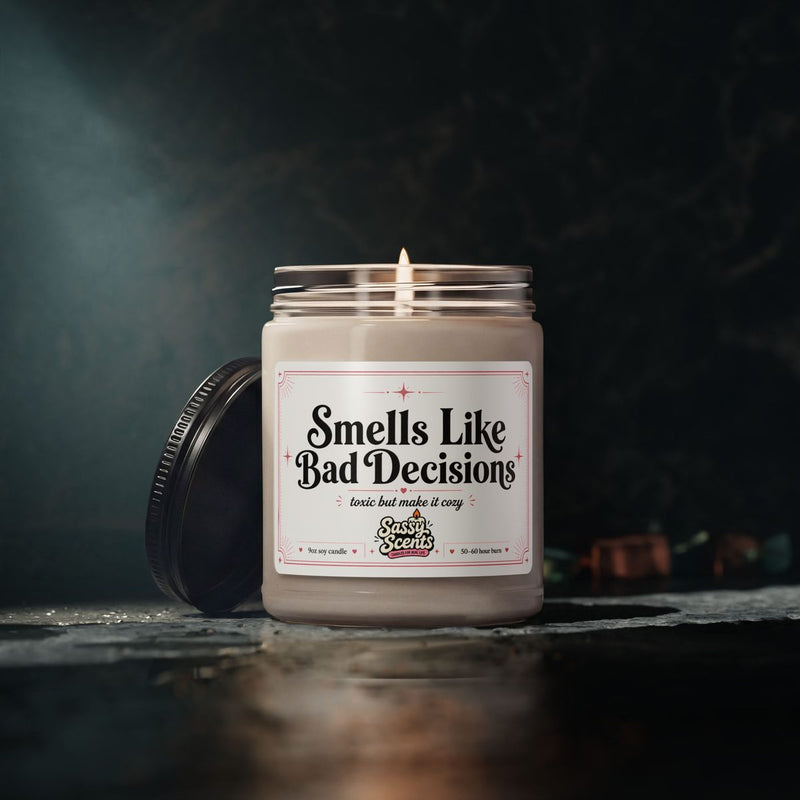 Sassy Scents candle glowing against a dark background